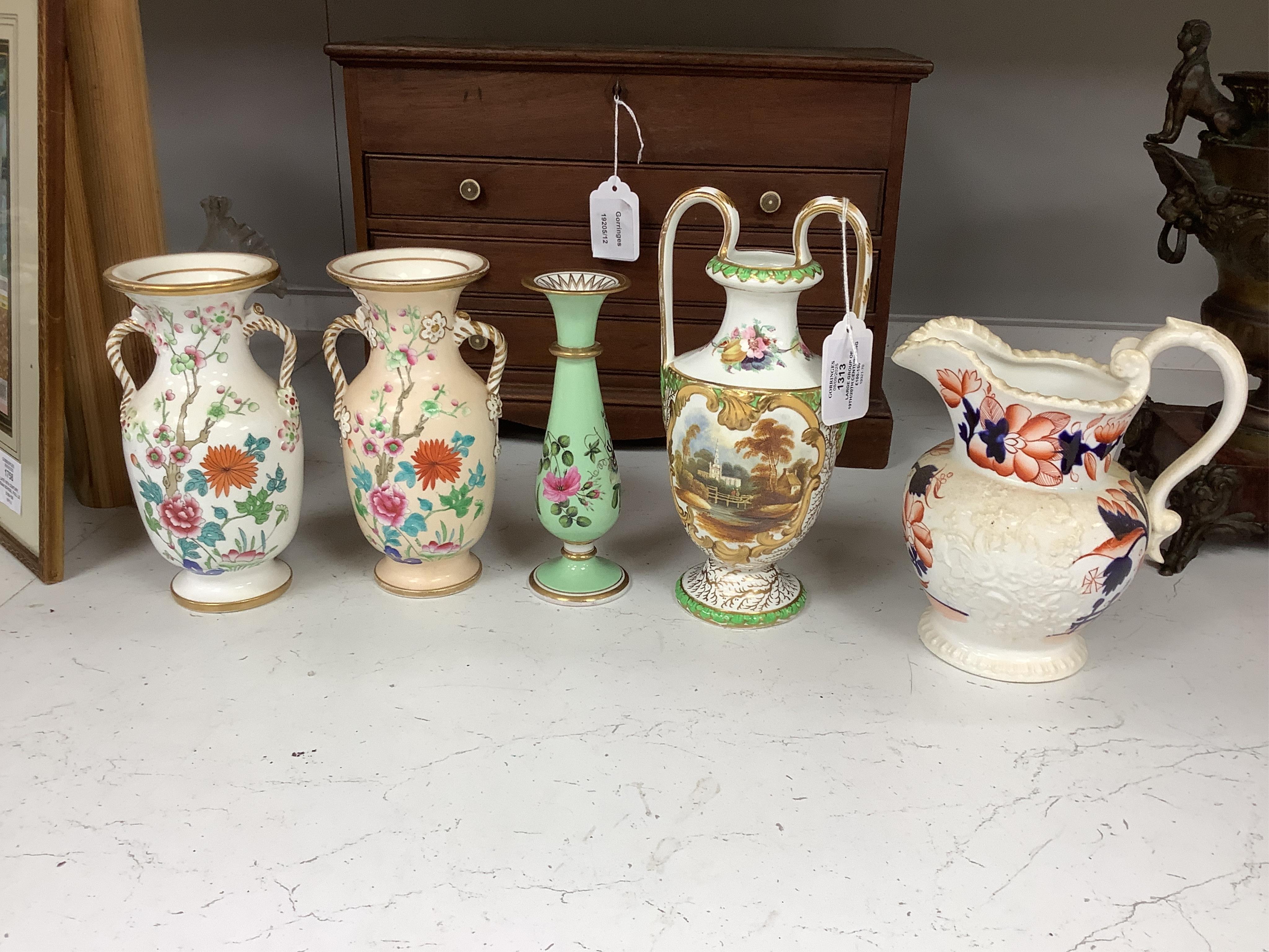 Large group of 19th/20th century English ceramics, to include a Rockingham basket, other English porcelain flower encrusted vessels, a Copeland and Garrett ewer, a Minton Sevres style beaker, a Wedgwood agate ware jug, R